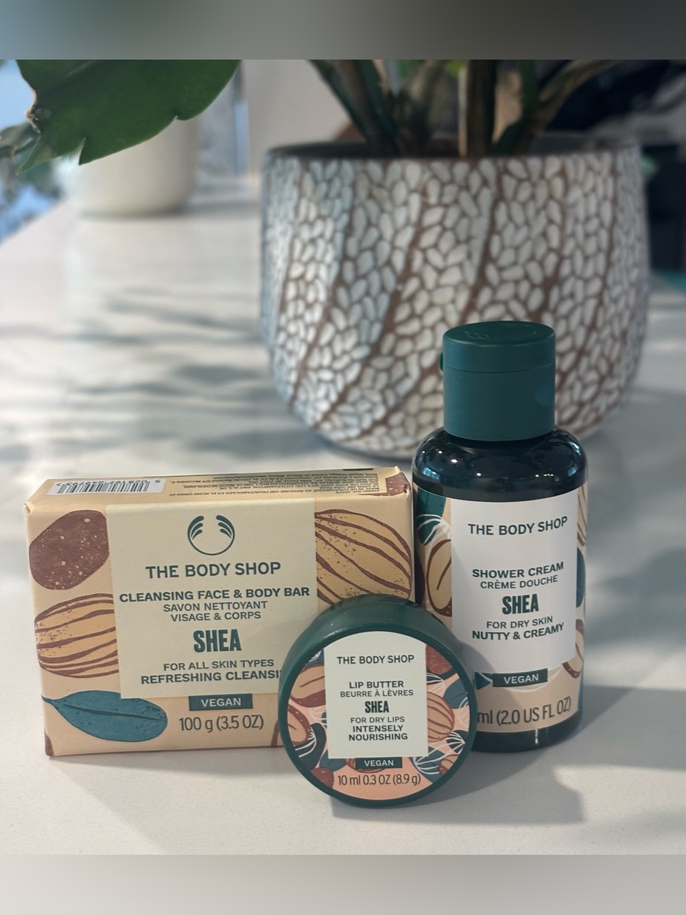 The Body Shop Shea Bundle of Mini Shower Cream, Face & Body Bar & Lip Butter